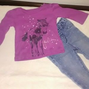 This is a shirt and pants outfit size 18 to 24m